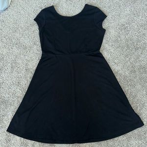 Black cap sleeve, a line dress. Scoopneck, fit and flare. Size large.